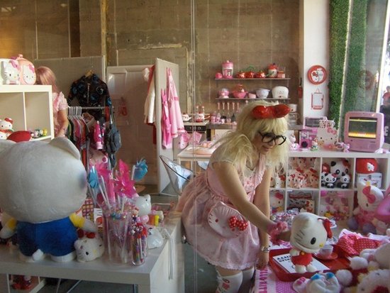 Cute girl having fun in her Hello Kitty room.