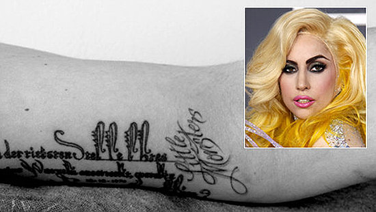 lady gaga tattoo on her back. Lady Gaga loves her fans.