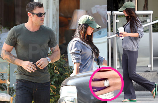 Megan and Brian are home again showing off the wedding bands they flaunted