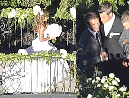 Ayda was spotted having photos taken in her wedding dress while Robbie was 
