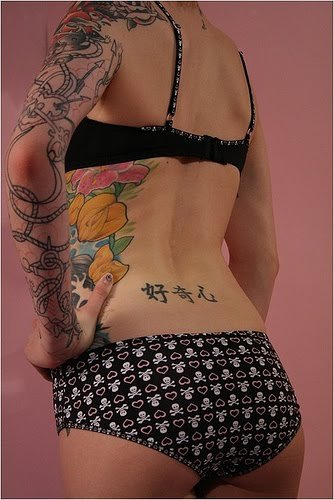 Tagged with: dragon tattoo, flower tattoo, full back tattoo, rib tattoo sexy 