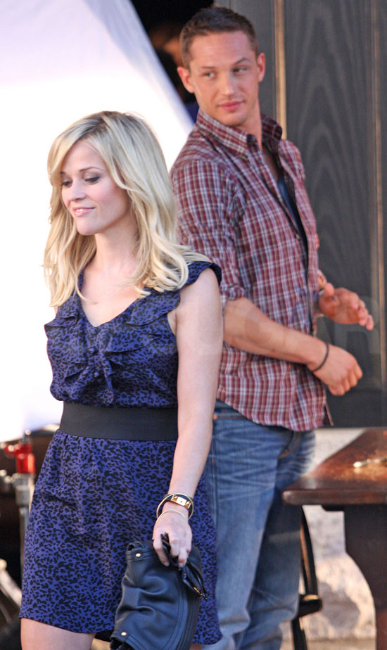 but she was all smiles on set a...