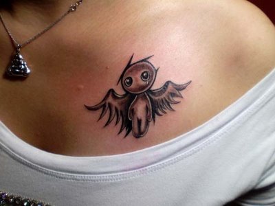 black and grey rose tattoo by