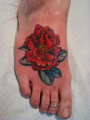 A tattoo will remain on the skin permanently through the entire life, 