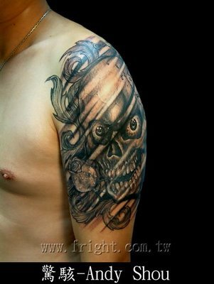 Looking for unique Tattoos? Skull and cross bones with a rose tattoo