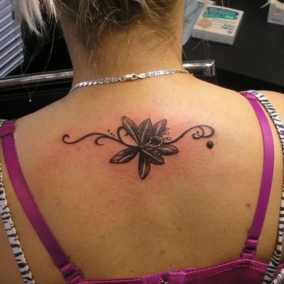 Related: women tattoos, back tattoo, flower tattoo, girly tattoo