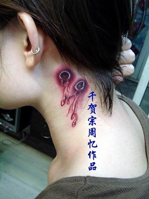Miami Ink Tattoo Gallery: July 2007 bitten wound by vampire tattoo art 