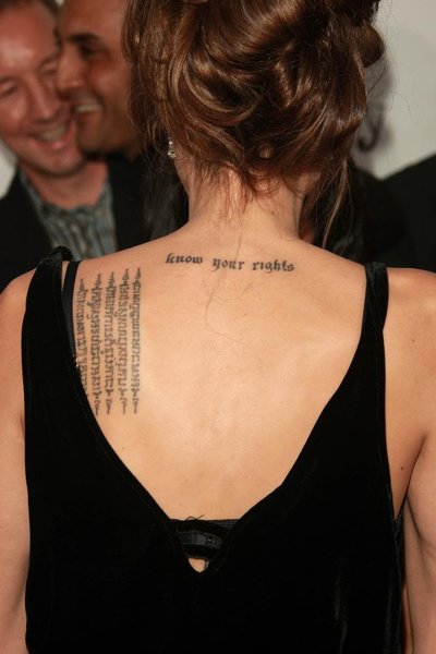 On her left shoulder, she has had her tattoo with the Chinese character for 