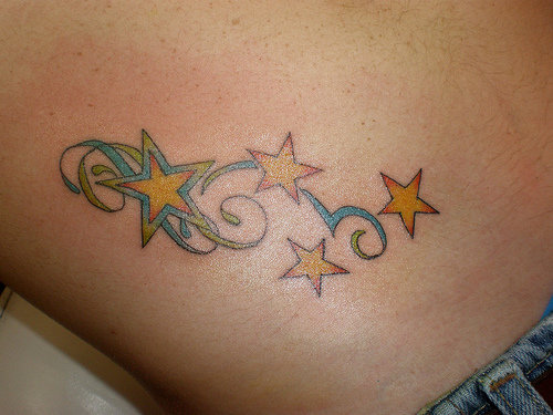 Looking for a lower back star tattoo designs for women
