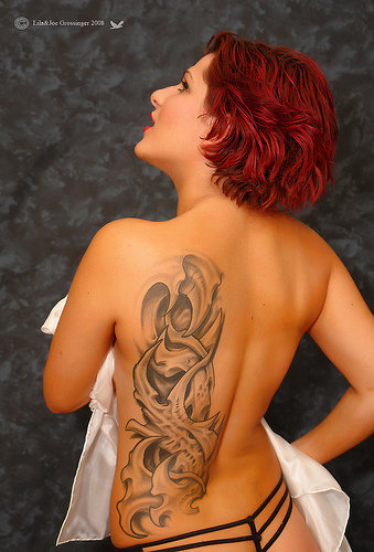 Black Ink of Women Back Tattoos