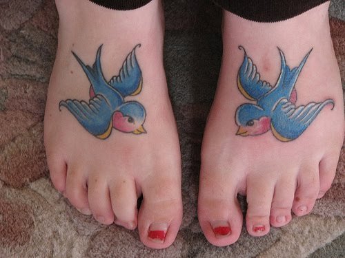 Bird Tattoos symbolize'freedom and beauty of' this is represented by the