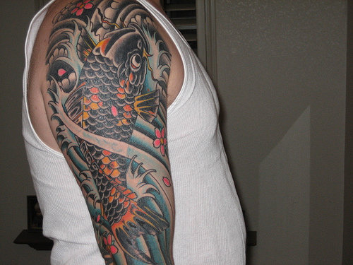 Fish Koi Tattoos Japanese Koi Fish Tattoos Design.Fish Koi Tattoos Meaning