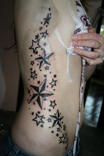Japanese Star Tattoo Design In Side Body Girl