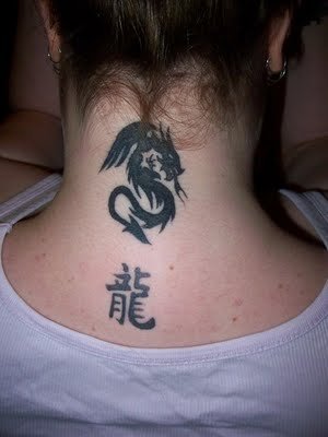 Japanese Letter Tattoo Design on Back Girl