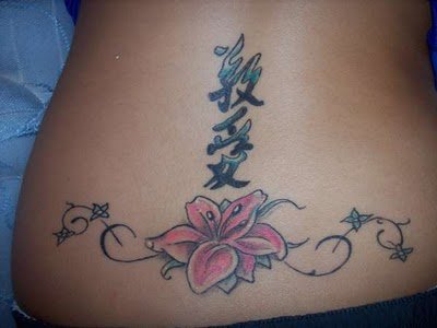 Japanese Flower and Kenji Tattoo Design on Lower Back Girl