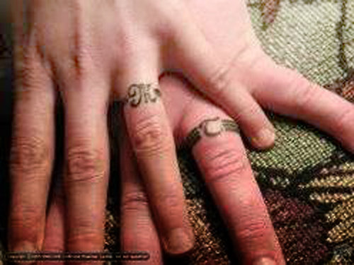 Tattoo Wedding Rings 18 Carat White Gold, Diamond & Thames Wood.