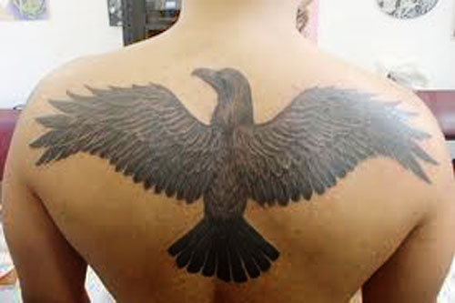 As a powerful spirit guide, the raven tattoo designs is the keeper of 
