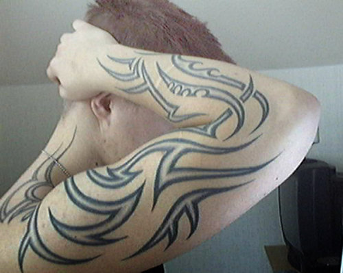The tribal arm tattoo has always been a popular tattoo.