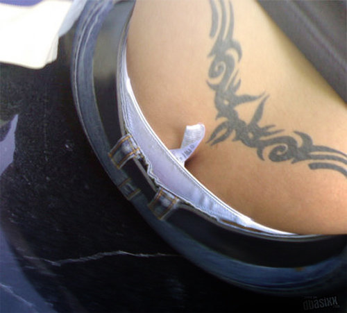 Sexy feminine lower back tattoos