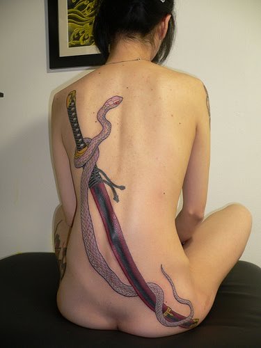 Snake and Sword lower back tattoos symbol ideas
