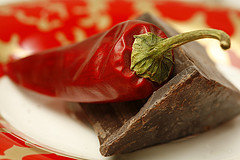 Chilli Peppers and Dark Chocolate on Red