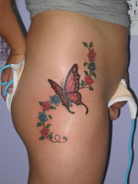 tattoo on girls thigh. tattoos on hip thigh.