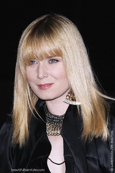 The Irish singer-songwriter has a popular medium hairstyle with bangs.