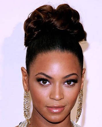 Keep it simple for the summer by adding a sexy and tight bun updo.