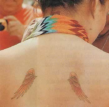 Nicole Richie neck tattoo design.