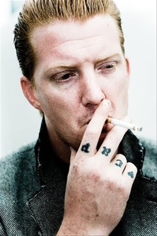Josh Homme has "Cap" and "Cam" tattooed on his knuckles.