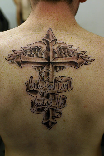 Back design of cross tattoo and wings with the words "Only God Can Judge Me" 