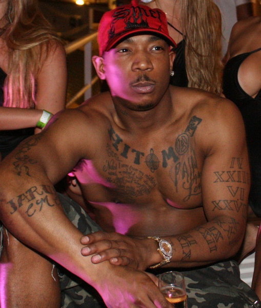 Ja Rule has several tattoo designs on both arms, including many roman 