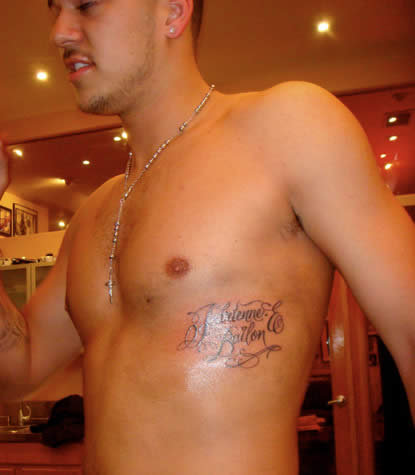 robert kardashian tattoo. Rob Kardashian ribcage tattoo.