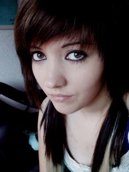 Emo Hairstyle with side swept bangs look good on any teen girl and gives her 