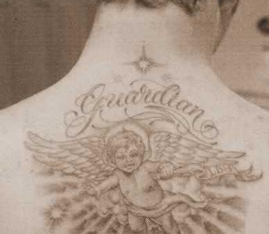 Angel tattoo on upper back.