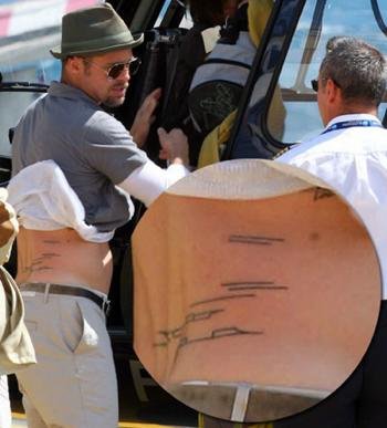brad pitts tattoos