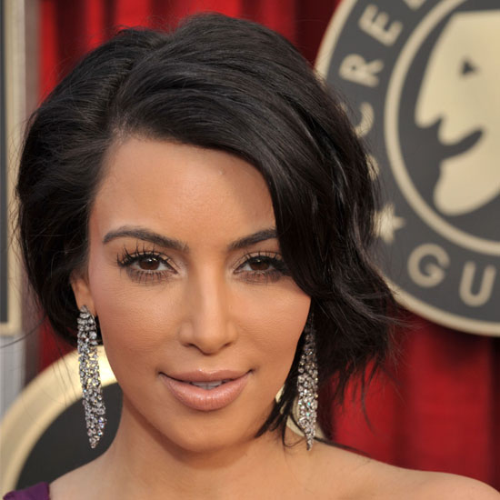 kim kardashian 2011 hair. Kim Kardashian tweeted to