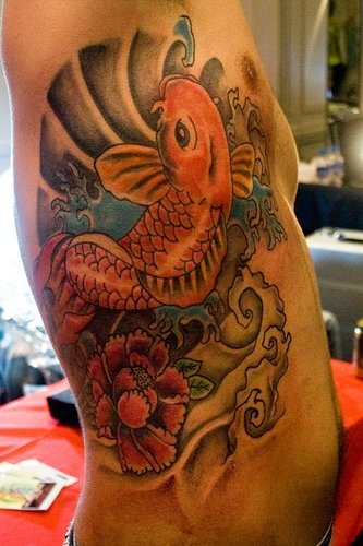 goldfish tattoo design. goldfish tattoo meaning.