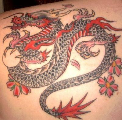 dragon tattoos men arm. Dragon tattoo designs are