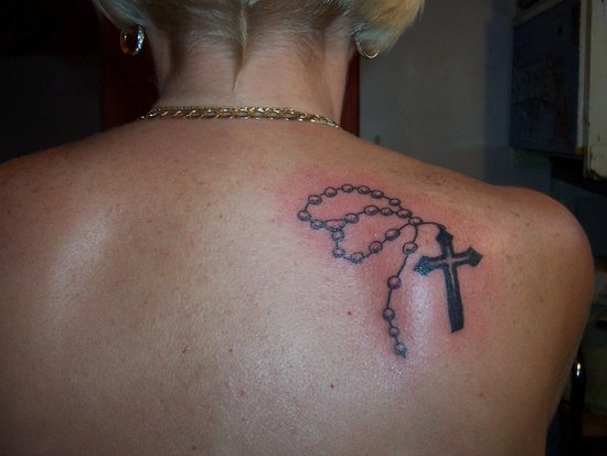 Depicted in the picture is the perfect example of a rosary tattoo