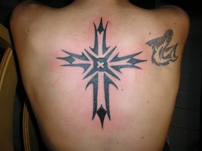 Christian Cross tribal back tattoo