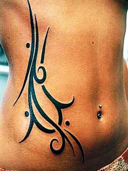 Tribal tattoos can be placed on the chest for men and on the lower back for