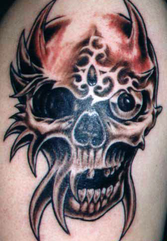 skull tribal tattoos