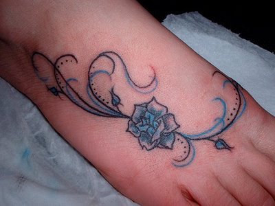 Tattoos aren't for men alone Today girl's foot tattoo designs are also