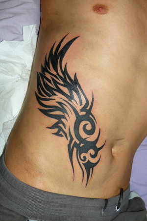 tribal wings tattoos