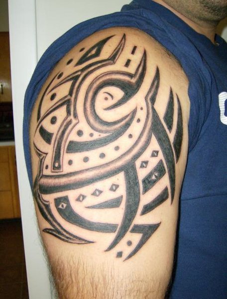 Tribal Tattoos On Upper Arm. A tribal tattoo is quite an