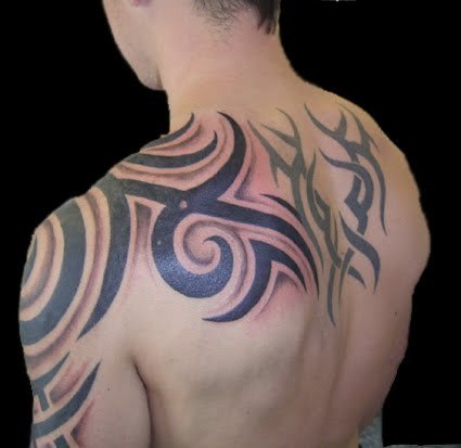 Tribal upper arm tattoo
