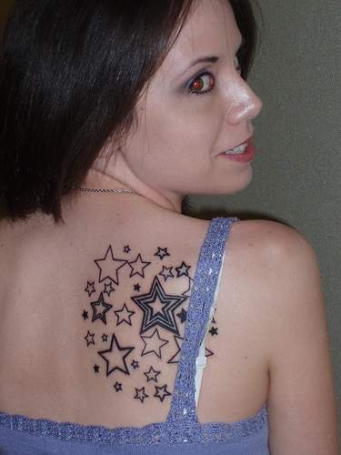 star tattoos on back. Upper Back Star Tattoos