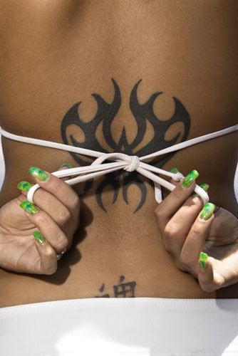 tribal dragon tattoo designs for men. Tribal tattoo designs are