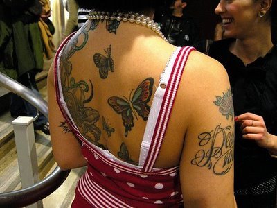 You can also combine your butterfly tattoos with other designs such as